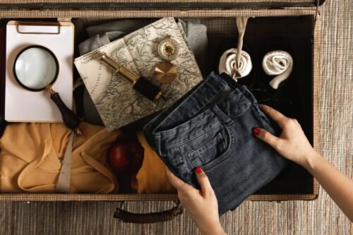 top-view-individual-packing-vintage-suitcase